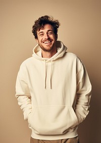 A happy british man wear cream hoodie sweatshirt sweater fashion.