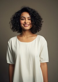 A happy mixed race british woman wear cream dress portrait fashion sleeve.