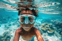 Happy samoan kid diver diving underwater recreation swimming.