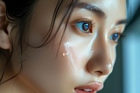 A Singaporean woman south east asian wearing serum portrait adult skin.