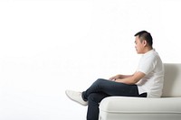 An east asian man suffering from sickness sitting adult sofa.