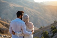 Middle eastern couple standing in mountain together adult photo love.