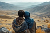 Middle eastern couple standing in mountain together outdoors photo love.