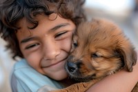 Middle eastern boy kissing his puppy portrait smiling mammal.
