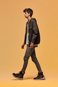 A teenager man walking in studio footwear standing jacket.