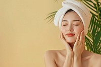 Singaporean woman doing skincare routine adult relaxation perfection.