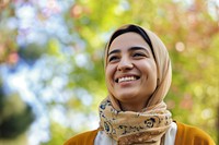 Young smiling middle eastern woman with scarf laughing adult smile.