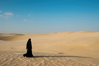 Middle eastern woman desert outdoors horizon.