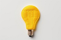 A yellow Light bulb in embroidery style lightbulb innovation simplicity.