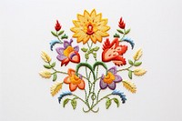 Flower in embroidery style needlework pattern textile.