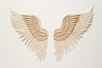 Wings in embroidery style angel white bird.