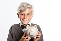 Kid holding his piggy bank money white background investment.