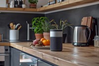 Modern smart speaker in kitchen coffeemaker refreshment countertop.