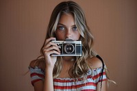 Teenager photographer camera photographing.