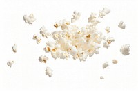 Popcorn grain falling white food white background.