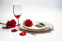 Honeymoon dinner in hotel flower glass knife.