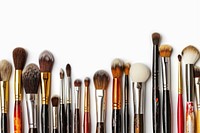 Makeup brushes tool white background arrangement.