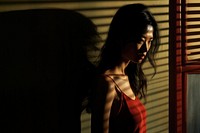 Asian woman portrait shadow red.