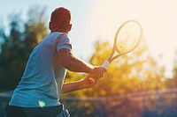 Man playing tennis adult outdoors sports.