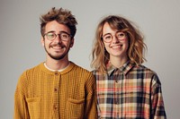 Two friends standing portrait glasses.