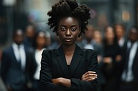 Black woman cross arm against business people portrait adult photo.