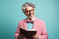 Happy teacher holding book glasses reading adult.