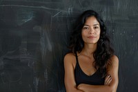 Latin woman teacher cross arm against black board blackboard portrait adult.