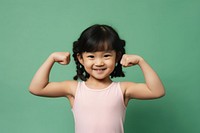 Asian little girl portrait child weightlifting.