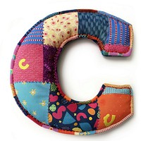 Letters C patchwork pattern textile.