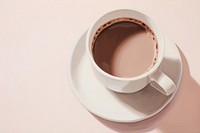 Close up of hot chocolate coffee saucer drink.