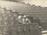 Two Men in an Auditorium by Erich Salomon
