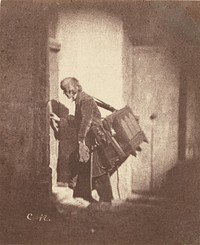 Organ Grinder at 21, quai Bourbon, Ile Saint-Louis, Paris by Charles Nègre