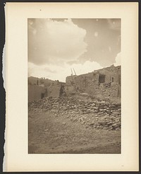 Man Seated on Pueblo Wall by Adam Clark A C  Vroman