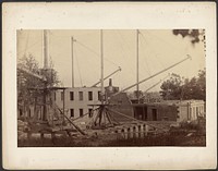 Building under construction by Lewis Emory Walker
