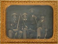 Portrait of four men with rifles