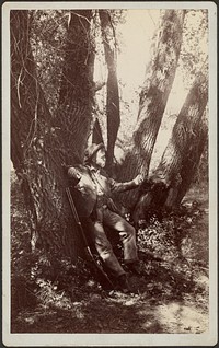 F.A. Williams resting against tree
