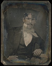 Portrait of a Seated Man with Moustache in Cap