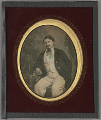 Portrait of a Seated Man Resting Arm on Books