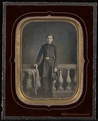 Portrait of a man in military attire, standing by Désiré François Millet