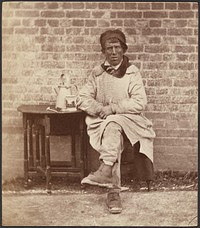 Man in a Smock Seated at a Table by John Whistler