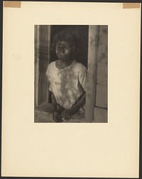 Young Black Girl Framed in Window by Doris Ulmann