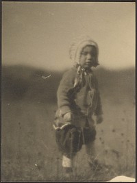 Child Wearing a Bonnet in Field by Louis Fleckenstein