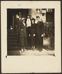 Group Standing Before Building by Louis Fleckenstein