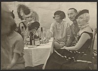 People Seated at a Table at a Banquet by Erich Salomon