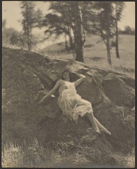 Woman Reclining on Rock Outcrop by Louis Fleckenstein
