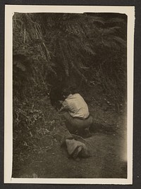 Figure Crouching in Hole by Louis Fleckenstein