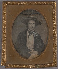 Portrait of a Young man wearing a wide-brimmed hat