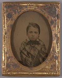 Portrait of a Little Boy in Checkered Coat and Bow Tie