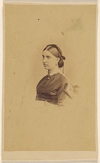 Unidentified woman in 3/4 profile, seated