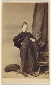 Unidentified boy, standing by A Melliss